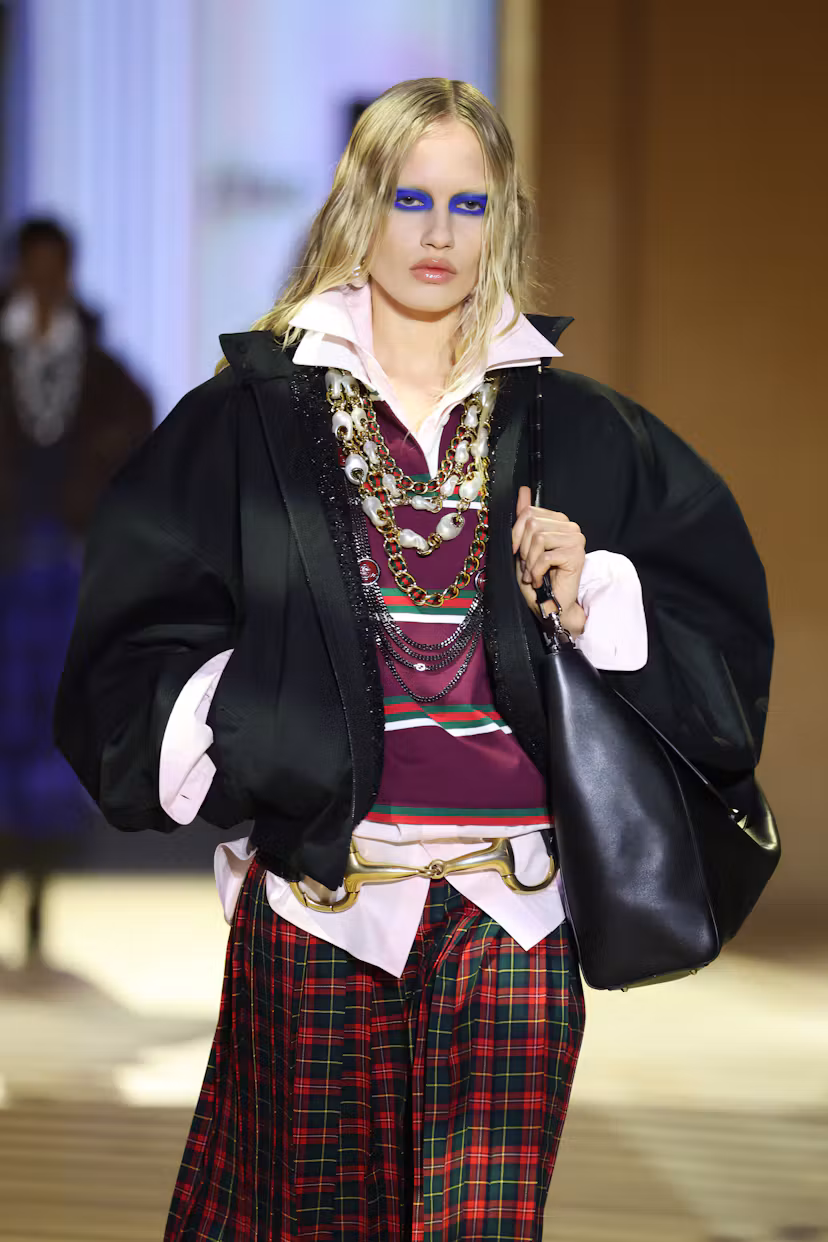 MILAN, ITALY - SEPTEMBER 25: A model walks the runway at the Gucci The Store Show during the Milan F...