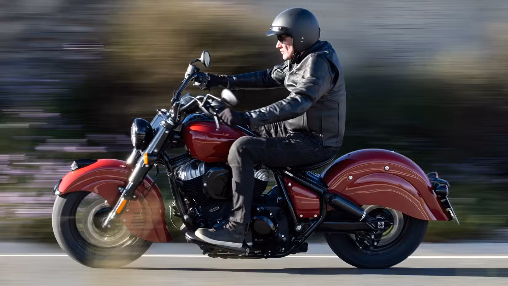 2026 Indian Chief Vintage rolling on the highway side profile view