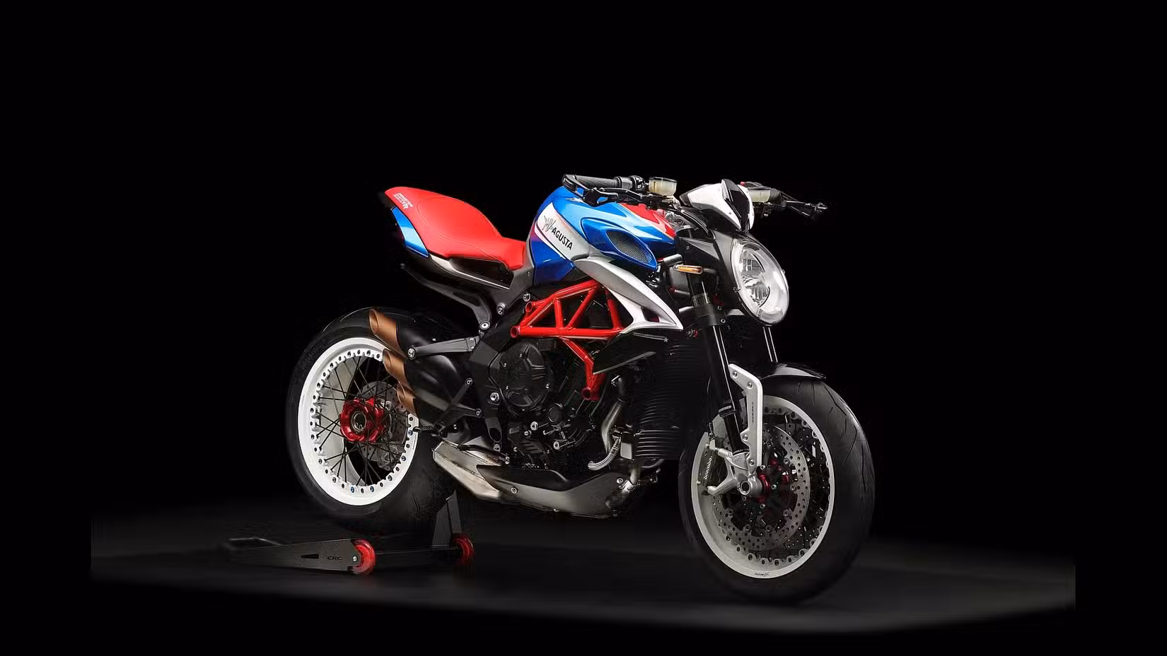 Studio shot of front right 3q of red white and blue MV Agusta Dragster 800
