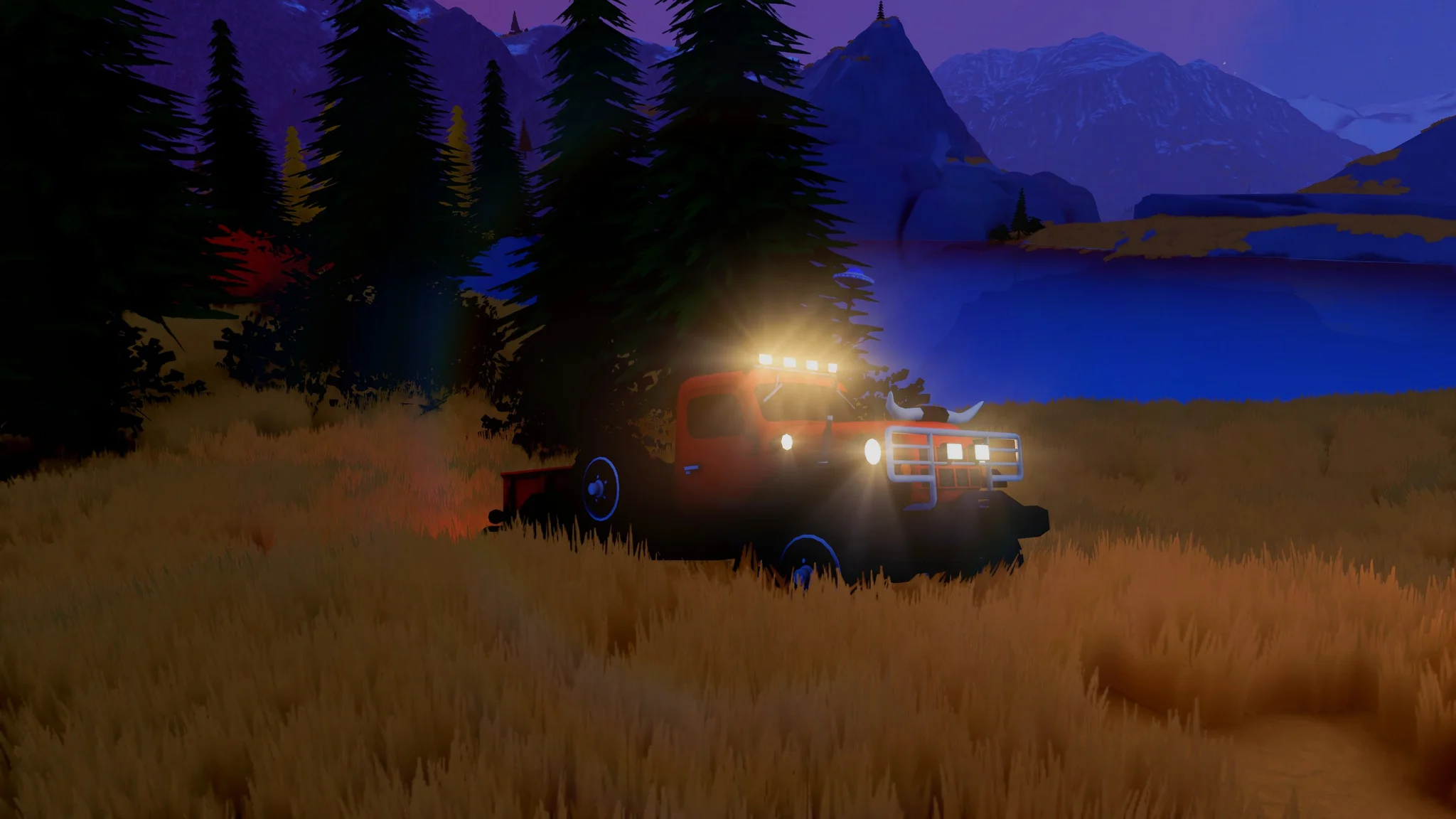 A pickup truck drives near a lake at night in Over the Hill.