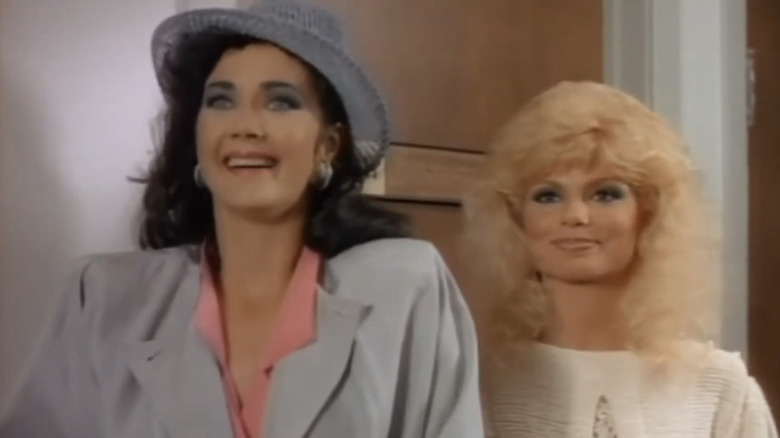 Lynda Carter's Carole Stanwyck looks shocked as she stands next to Loni Anderson's Sydney Kovack in Partners in Crime