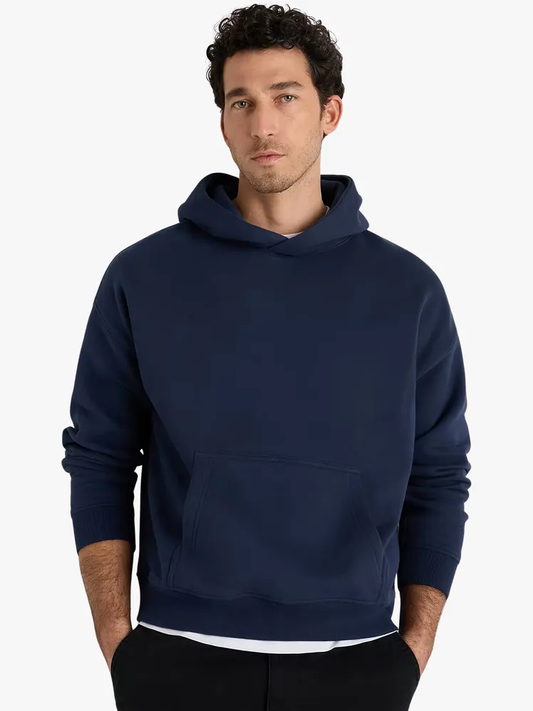 Image may contain: Clothing, Knitwear, Sweater, Sweatshirt, Hoodie, Adult, and Person