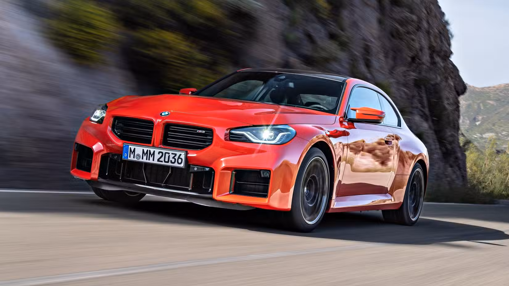 A front 3/4 actions shot of a 2023 BMW M2 
