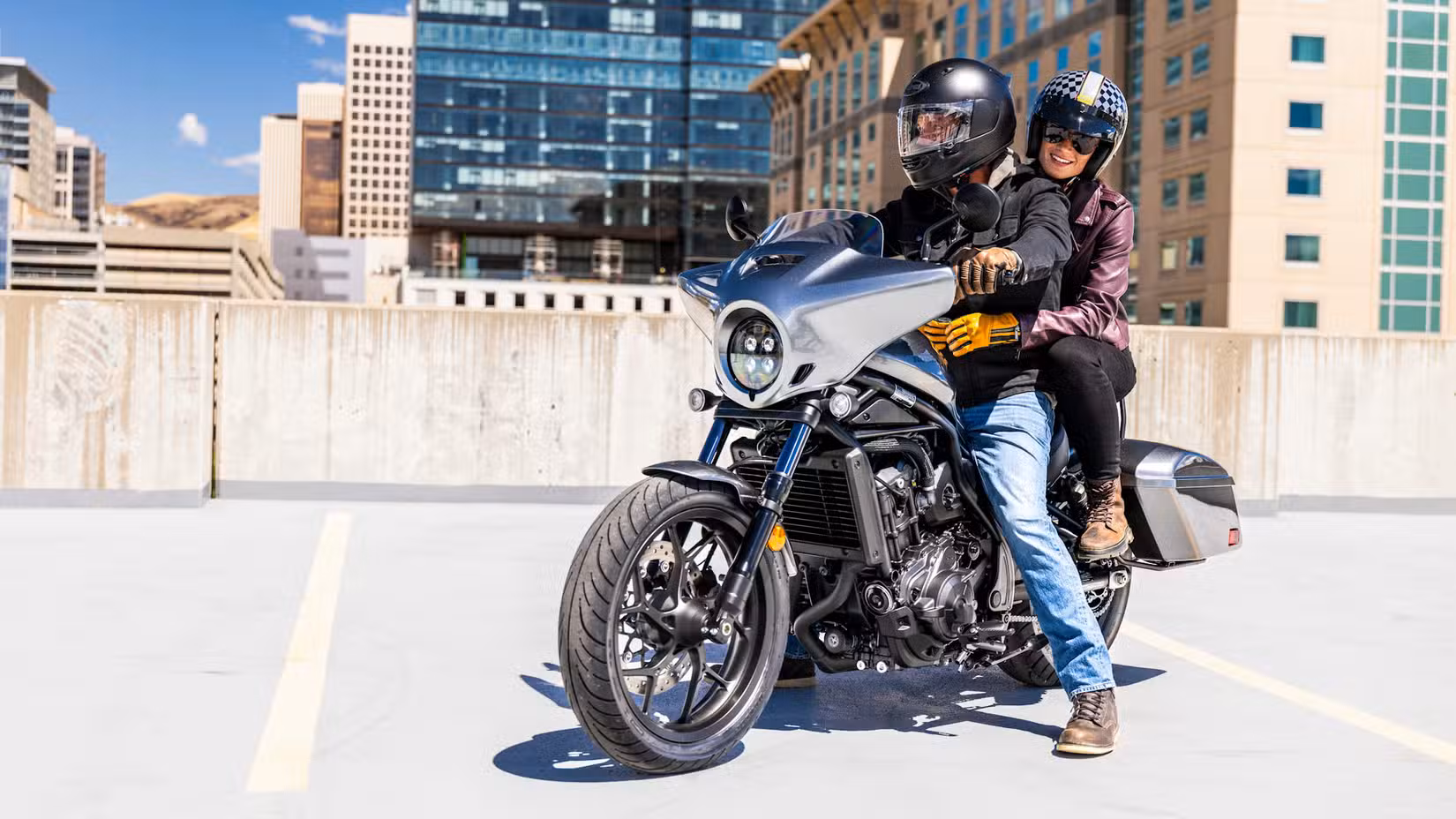 Rider and passenger on an accessorized 2025 Honda Rebel 1100T