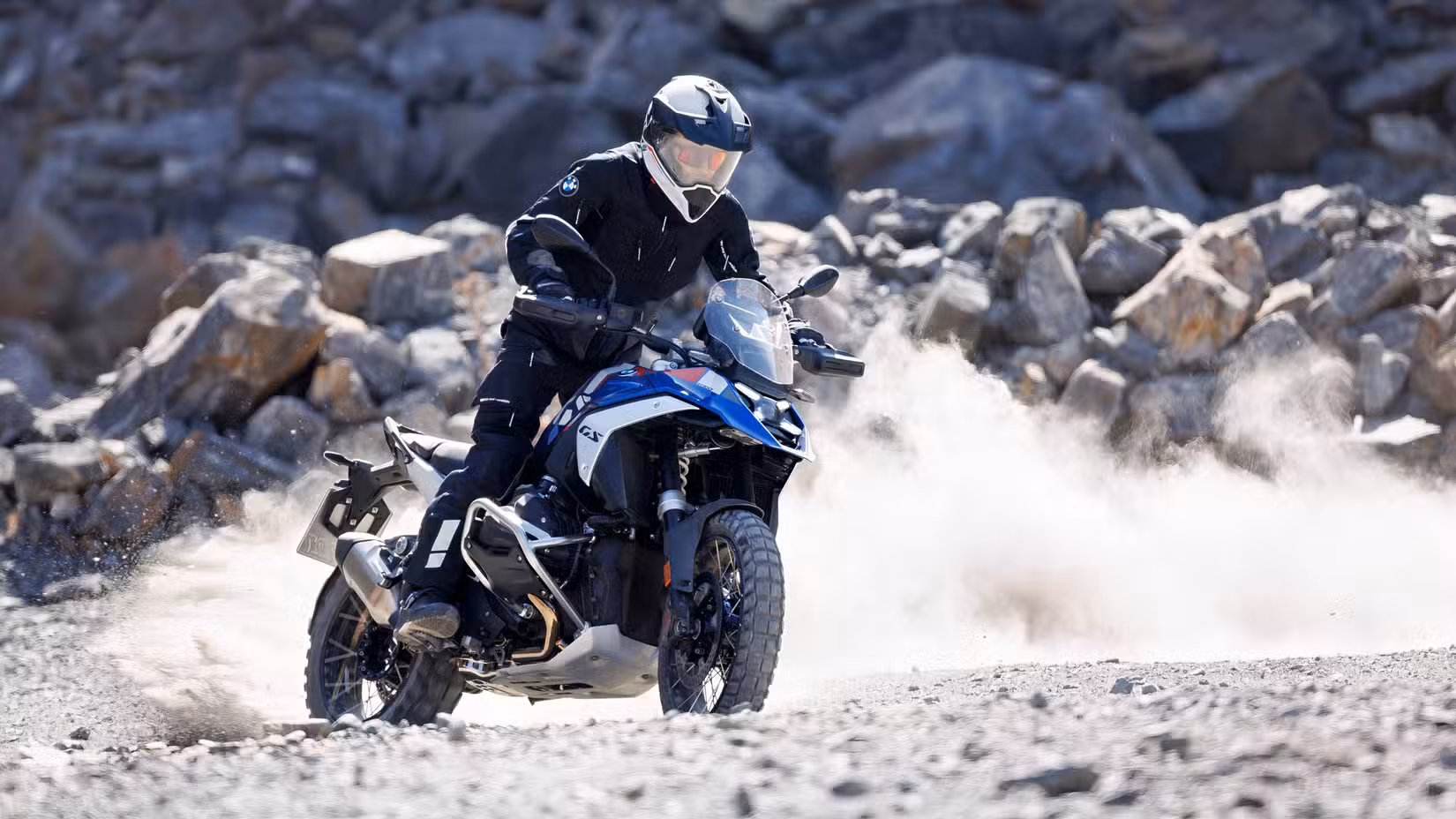 Action shot of a  BMW R 1300 GS getting ridden off-road