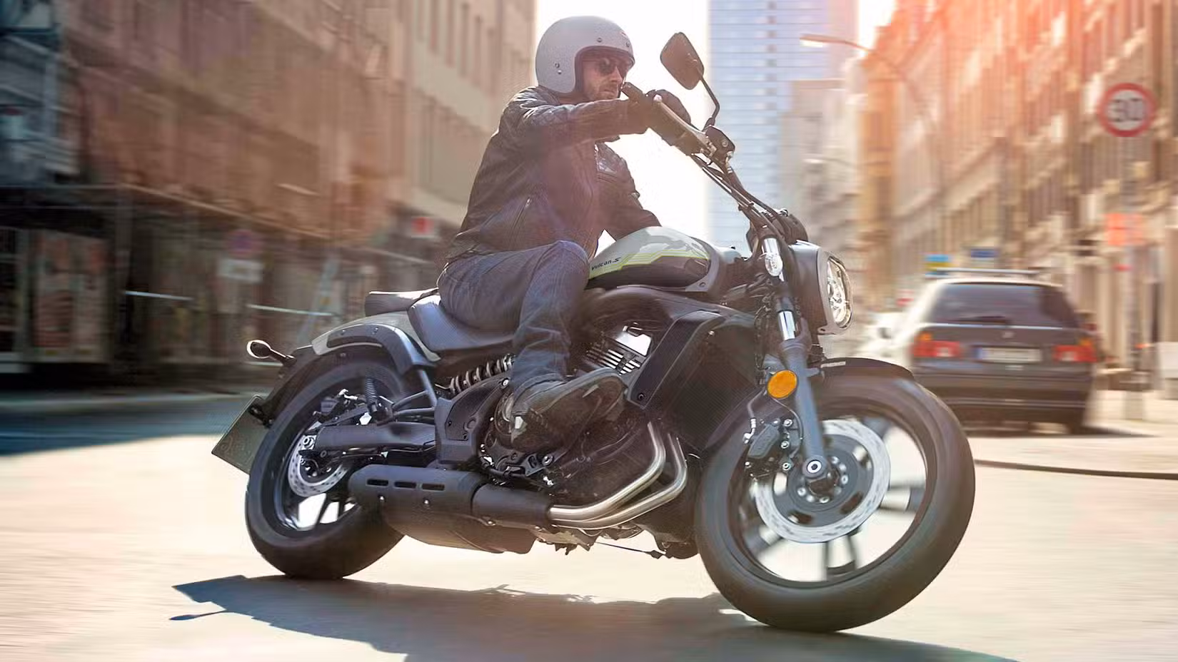 Rider on 2026 Kawasaki Vulcan S cruising through town