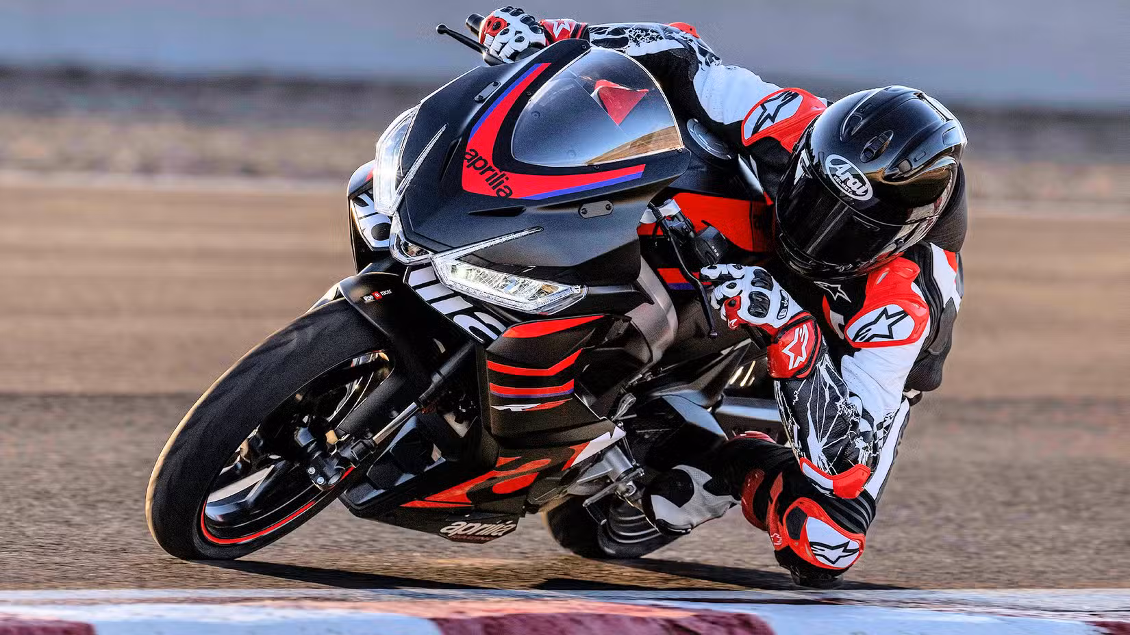 2024 Aprilia RS 457 Taking A Left Turn On The Racetrack