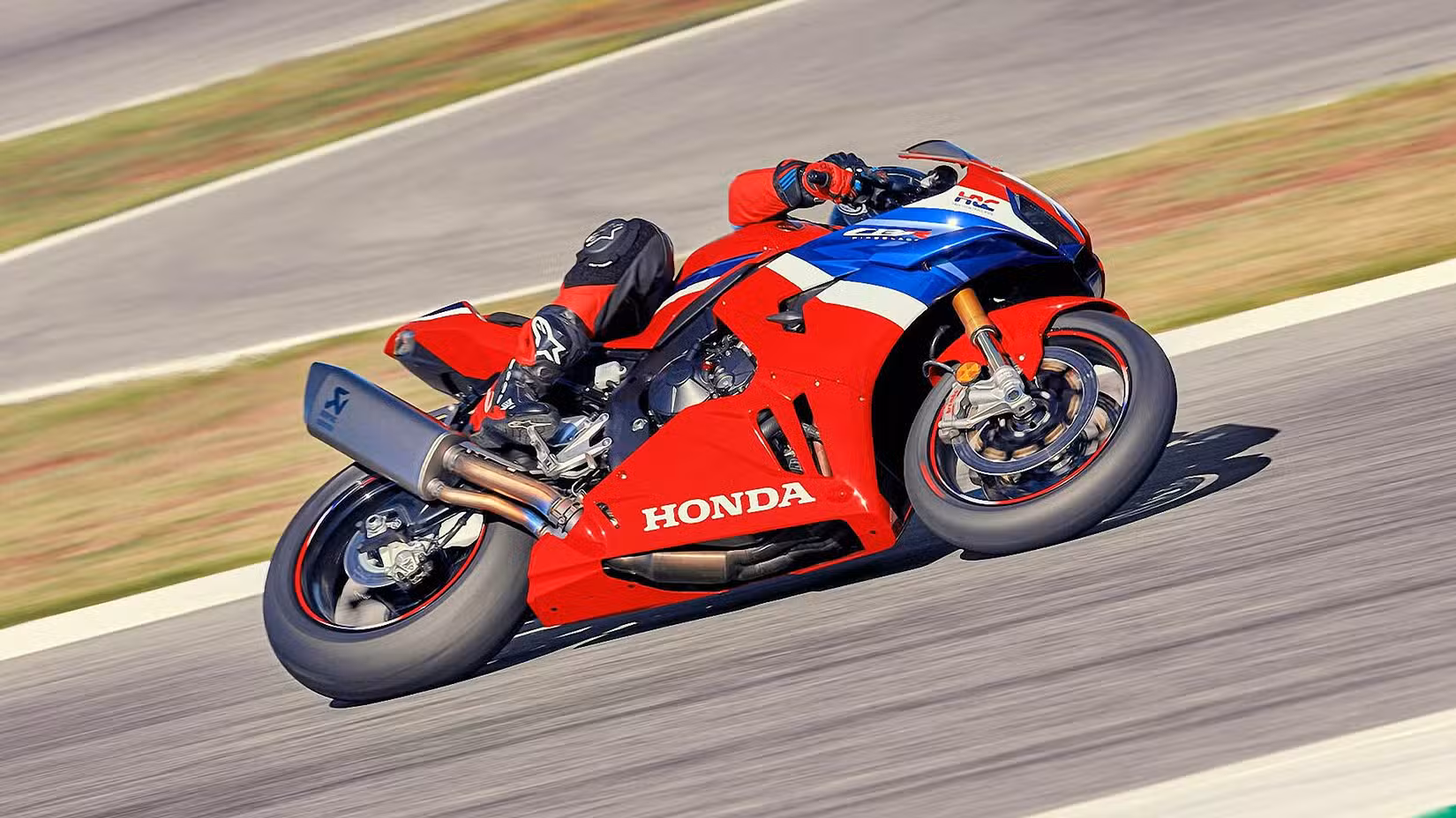 Rider on a 2025 Honda CBR1000RR-R Fireblade SP With Knee Down Lower Fairing View