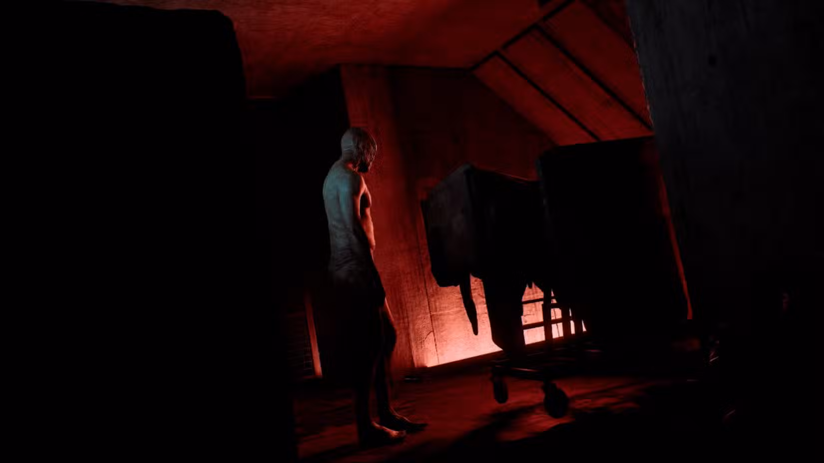 A monster standing in a concrete hallway.