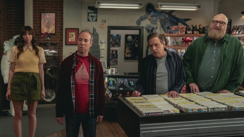 Denise Stuart Barry and Bert looking confused in the comic book shop in Stuart Fails to Save the Universe
