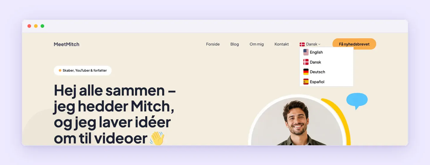 WordPress site translated into Danish with Superb Translate, with the language switcher open showing English, Dansk, Deutsch and Español.