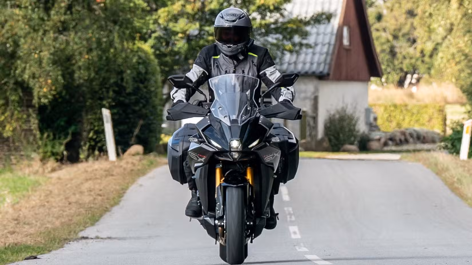 2026 Suzuki GSX-S1000GX+ front fascia rolling cinematic shot view