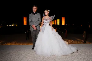 PARIS, FRANCE - OCTOBER 06: Joseph Zada and Mckenna Grace attend Elegance Is Authority: The Story, Style, And Power Of Panem at Musee Rodin on October 06, 2026 in Paris, France. (Photo by Victor Boyko/Getty Images for Lionsgate)