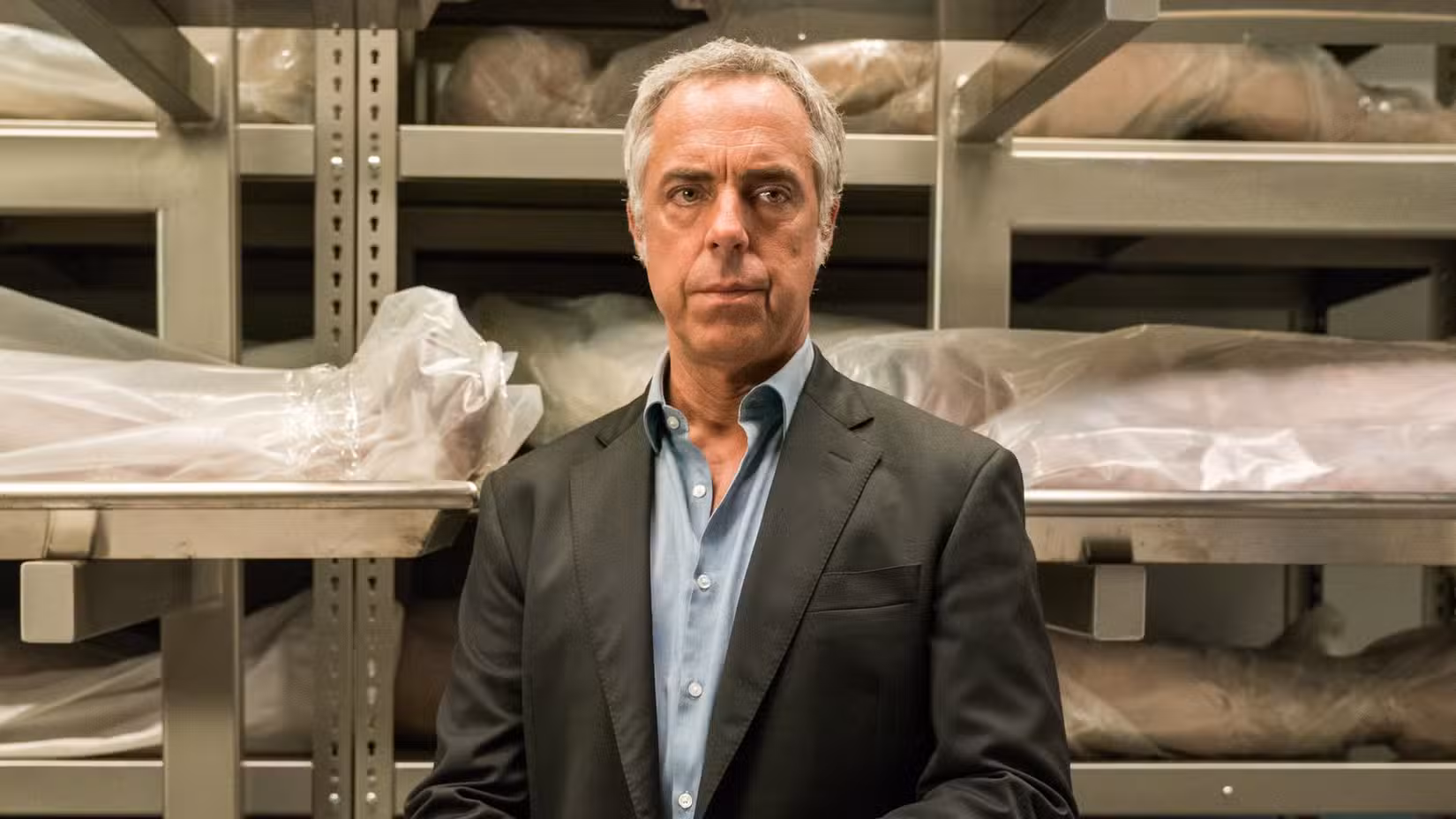 Titus Welliver's Bosch stands in a morgue in Bosch