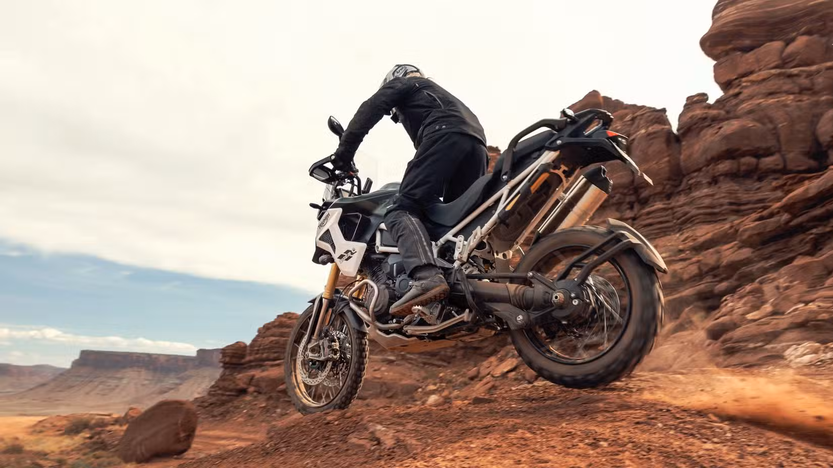 An action shot of the Triumph Tiger 1200 Rally Pro off-roading