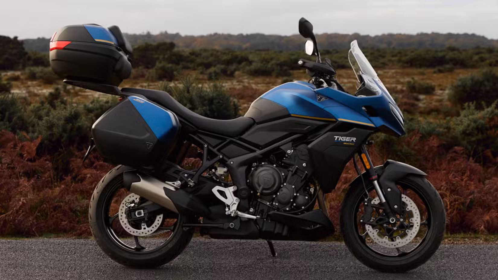 A Triumph Tiger Sport 800 Tour parked on its side stand