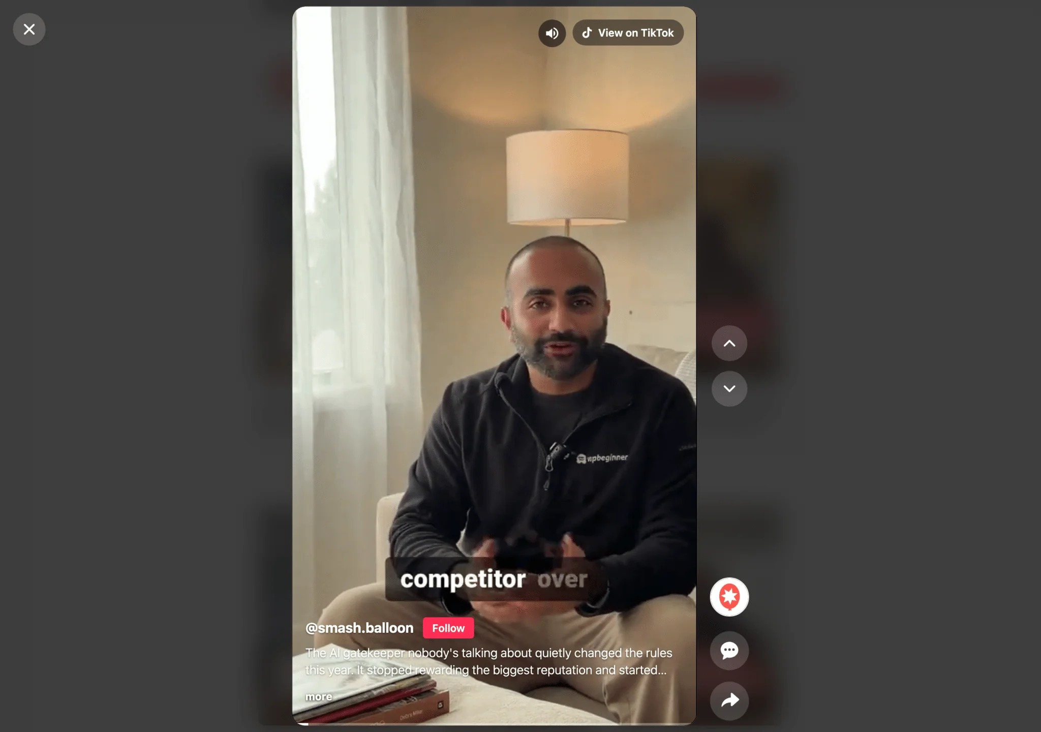 A TikTok video playing in the full-screen Swipe View on a computer, with up and down arrows to move between videos, a View on TikTok button, and Follow, comment and share buttons