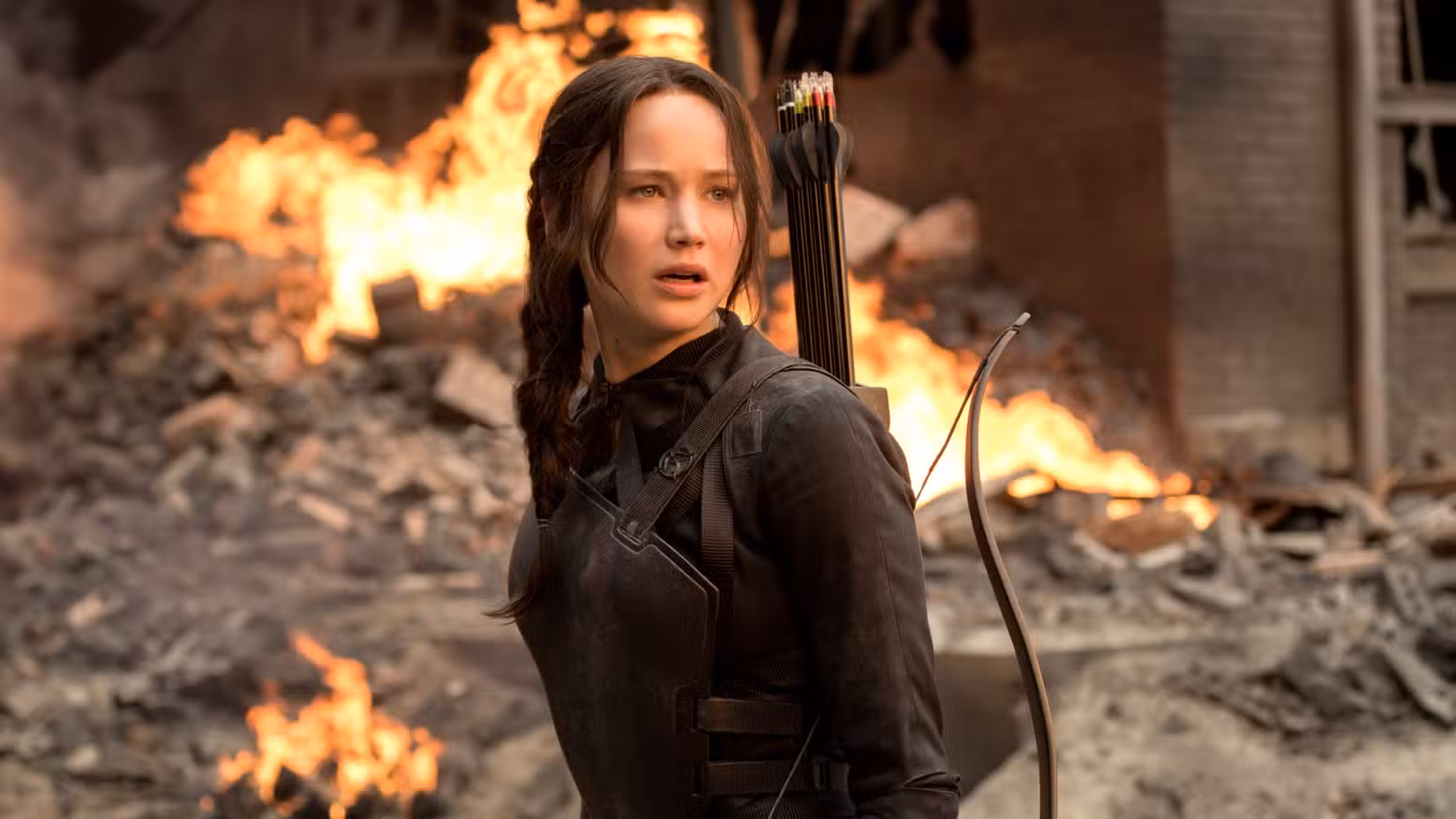 Katniss Everdeen against a fiery background